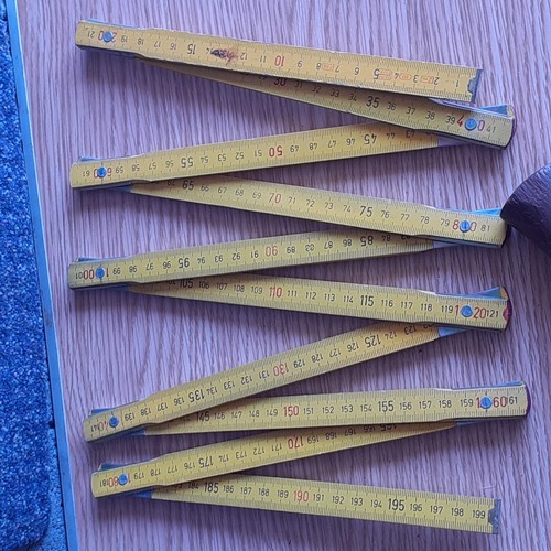 5 - Collection of tools including foldaway measure, new ear defenders, Stanley plane, pick and claw tool... 