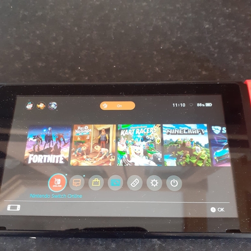25 - Nintendo Switch - holds chargers, all buttons work as normal, seems to function - console only