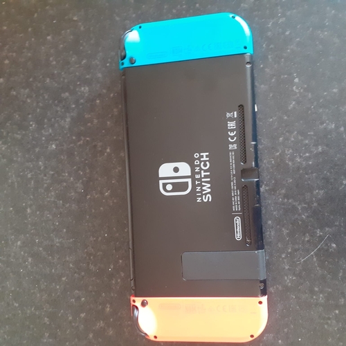 25 - Nintendo Switch - holds chargers, all buttons work as normal, seems to function - console only