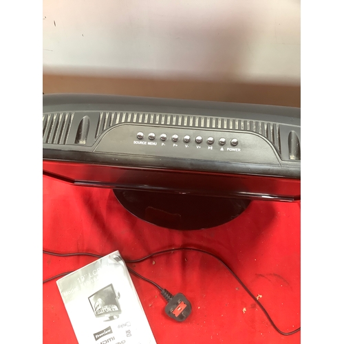 20 - UMC LCD 19” TV with built in DVD player. Comes with remote and manual