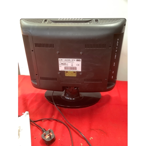20 - UMC LCD 19” TV with built in DVD player. Comes with remote and manual