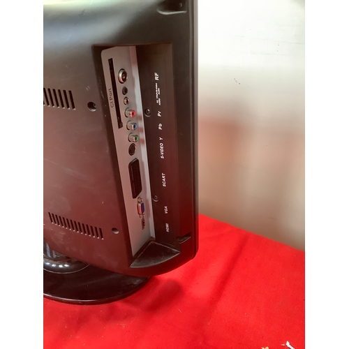 20 - UMC LCD 19” TV with built in DVD player. Comes with remote and manual