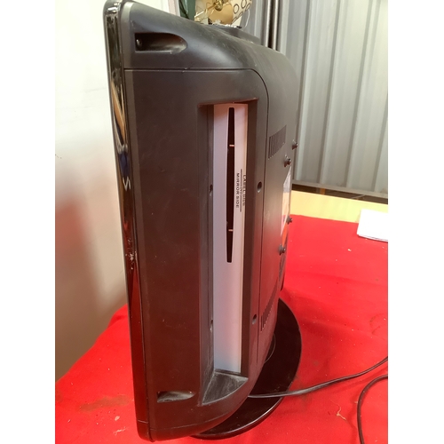 20 - UMC LCD 19” TV with built in DVD player. Comes with remote and manual