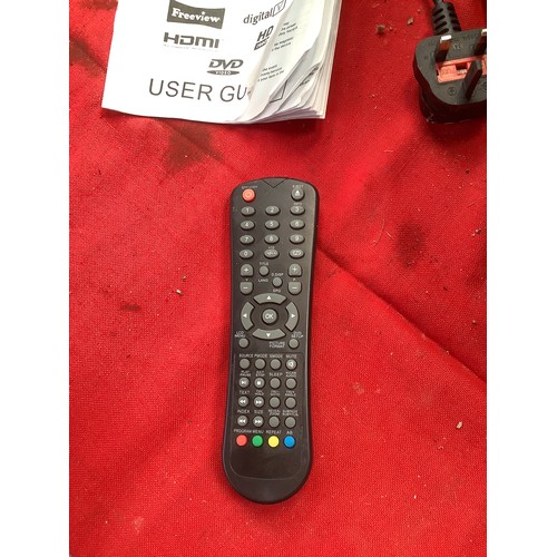 20 - UMC LCD 19” TV with built in DVD player. Comes with remote and manual