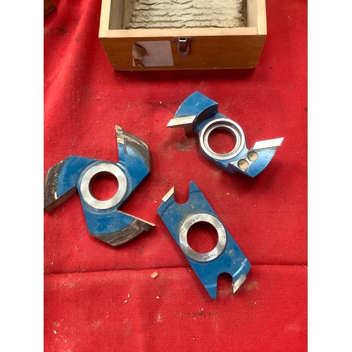 32 - Two boxes containing a set of moulder cutters and heavy duty carbide-tipped shaper cutters