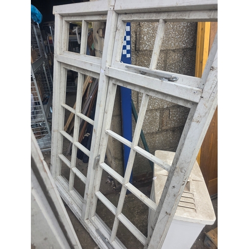 2 wood Georgian style window frames approx 4ft wide and 5ft high
