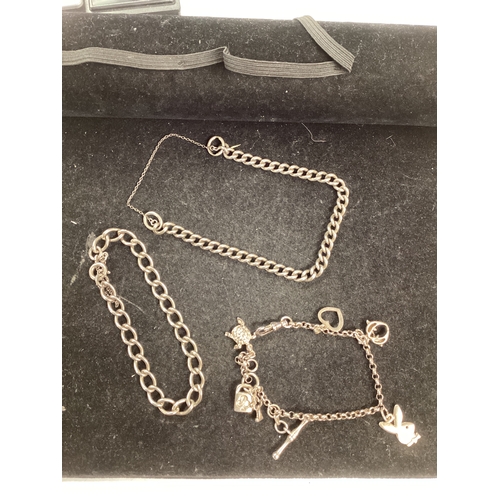 3 x silver bracelets one is a charm bracelet with a T-bone fastening 42.7g