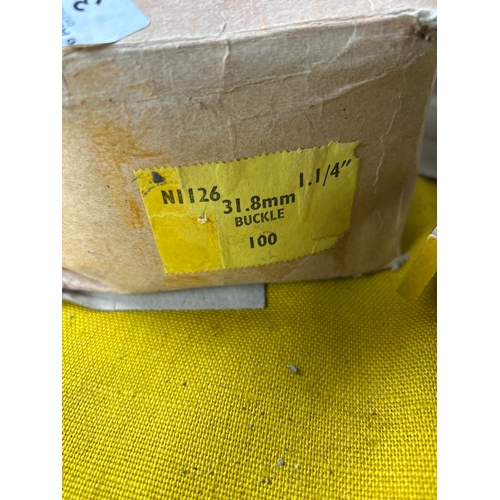 2x boxes full of small brass buckles