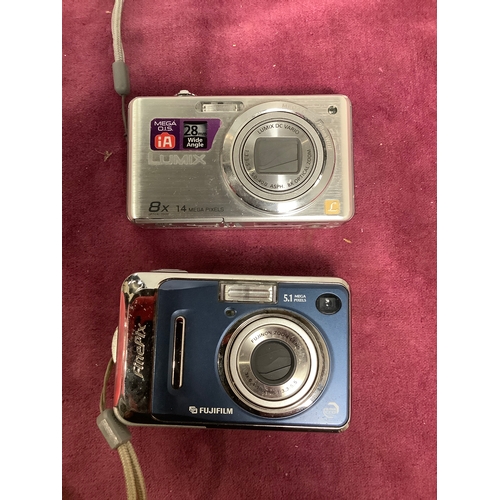 Panasonic Lumix and Fujifilm Finepix digital cameras and a pair of ...