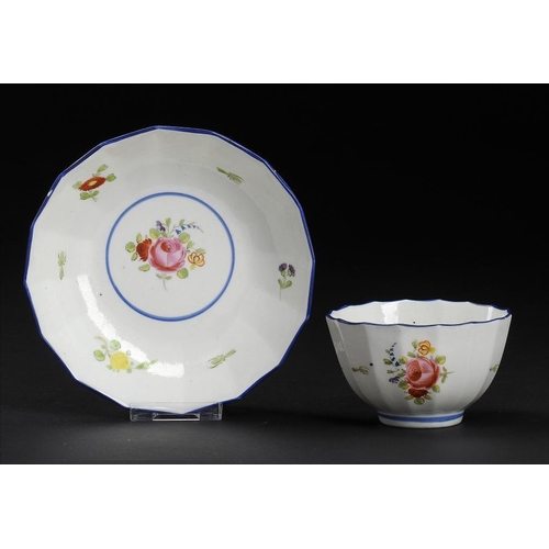 102 - A CALCUT POLYCHROME FLUTED TEA BOWL AND SAUCER, C1794-96 saucer 13cm diamProvenance: Field McIntyre.... 