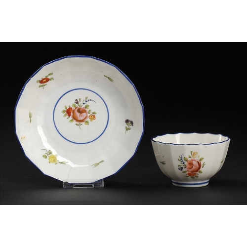 103 - A CALCUT POLYCHROME FLUTED TEA BOWL AND SAUCER, C1794-96  saucer 13cm diamProvenance: Godden Referen... 