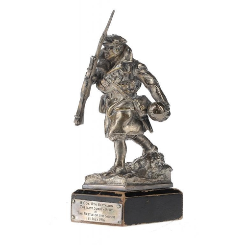 1243 - BATTLE OF THE SOMME.  A SILVERED BRONZE COMMEMORATIVE STATUETTE OF CAPT W P  NEVILL CHARGING THE GER... 