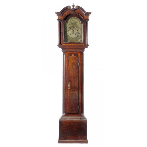 1269 - A GEORGE III OAK EIGHT DAY LONGCASE CLOCK  the breakarched brass dial engraved on the chapter ring E... 