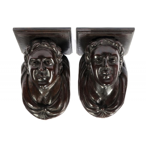 1386 - A PAIR OF CARVED OAK CORBELS, 19TH C  as the head of a man a l'anticha, 33cm h