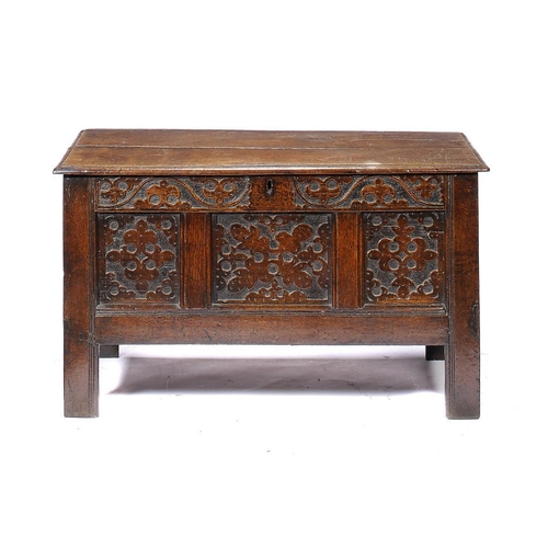 1393 - AN OAK CHEST, ELEMENTS 17TH C  the front carved with strapwork, 65cm h; 52 x 112cm