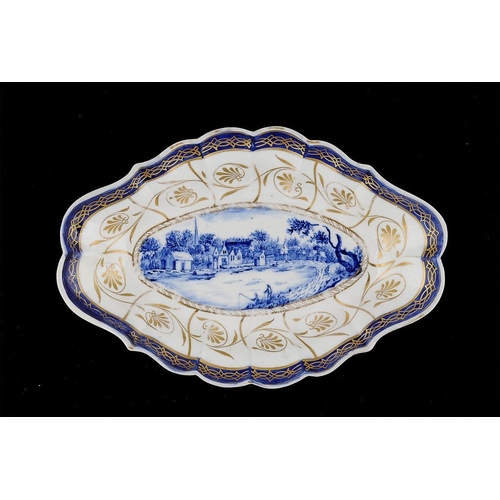 62 - A CAUGHLEY BLUE AND GILT BRIGHT LANDSCAPE DISH, C1788-92  attractively painted with a village scene ... 