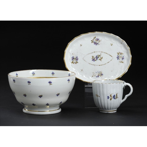 80 - A CAUGHLEY POLYCHROME SLOP BASIN AND A SIMILAR CAUGHLEY COFFEE CUP AND SHANKED OVAL TEAPOT STAND, C1... 