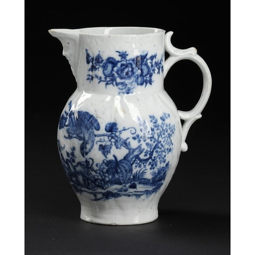 82 - A CAUGHLEY BLUE AND WHITE MASK JUG, C1796-99 printed with the Parrot Pecking Fruit pattern, 15.5cm h... 