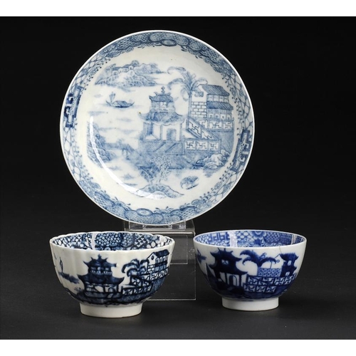 87 - TWO RARE CAUGHLEY BLUE AND WHITE TEA BOWLS AND A MATCHING   SAUCER, C1797-99  printed with the Banan... 