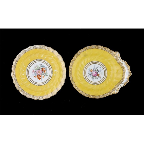 91 - A CAUGHLEY YELLOW GROUND SHELL SHAPED DESSERT DISH AND PLATE, C1797-99  painted with a central bouqu... 