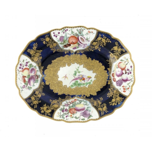 186 - A CHELSEA MAZARINE GROUND DISH, C1765  enamelled with birds and fruit, 29.5cm w, gilt anchor... 