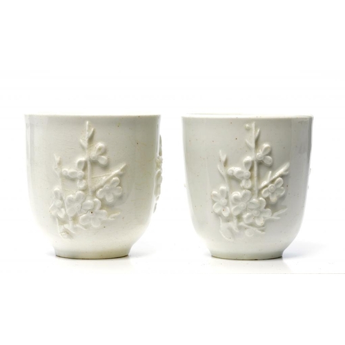 188 - TWO BOW WHITE GLAZED   PRUNUS MOULDED COFFEE CUPS, C1760  6cm h