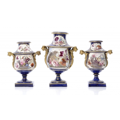 209 - A STAFFORDSHIRE PORCELAIN COBALT GROUND GARNITURE OF THREE VASES, C1820  with gilt winged grotesque ... 