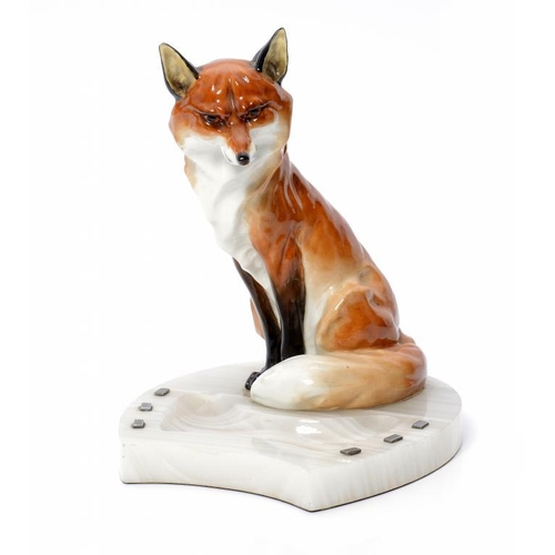 219 - A ROYAL WORCESTER MODEL OF A FOX MOUNTED ON CONTEMPORARY HORSESHOE SHAPED ONYX ASHTRAY, C1930 19cm h... 