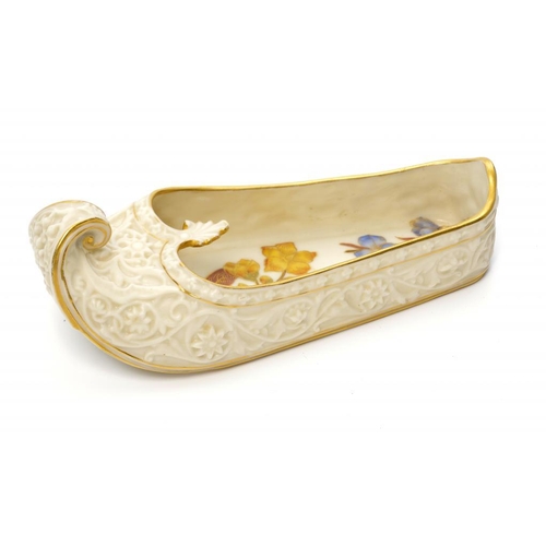 233 - A ROYAL WORCESTER OLD IVORY 'INDIAN SLIPPER SHOE', C1886 16.5cm l, impressed and printed marks... 