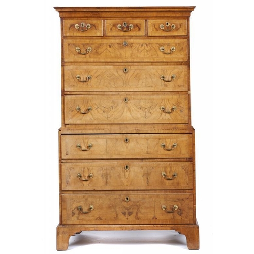 1003 - A GEORGE II WALNUT AND FEATHERBANDED CHEST-ON-CHEST, MID 18TH C the sides crossbanded, 182cm h; 52 x... 