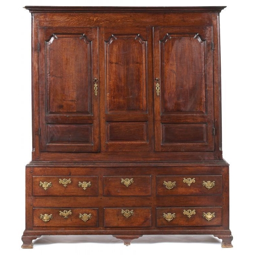 1017 - A GEORGE III OAK PRESS, LATE 18TH C adapted as a hall cupboard, the upper part with panelled doors, ... 