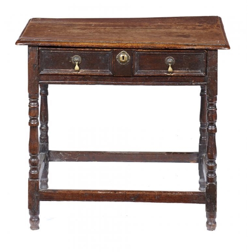 1018 - A WILLIAM III OAK SIDE TABLE, LATE 17TH C fitted with twin geometric moulded drawer, on baluster leg... 