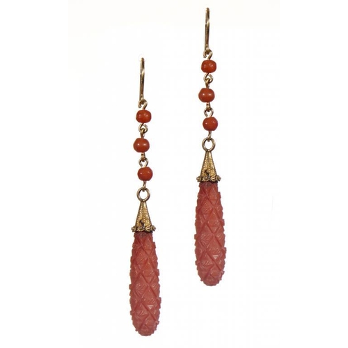 107 - A PAIR OF GEORGIAN CARVED CORAL EARRINGS, EARLY 19TH C gold wire loops, 50mm, unmarked, 4.1g... 