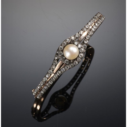 74 - A FRENCH PEARL AND DIAMOND BANGLE, C 1890 in gold, 56 x 46 mm, unmarked, 10.2g, morocco case signed ... 