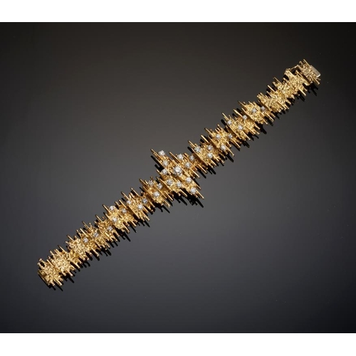 76 - A GEORGE WEIL DIAMOND BRACELET, 1970s in gold, 18cm, signed G. Weil, marked PLAT 18ct, 54.5g... 