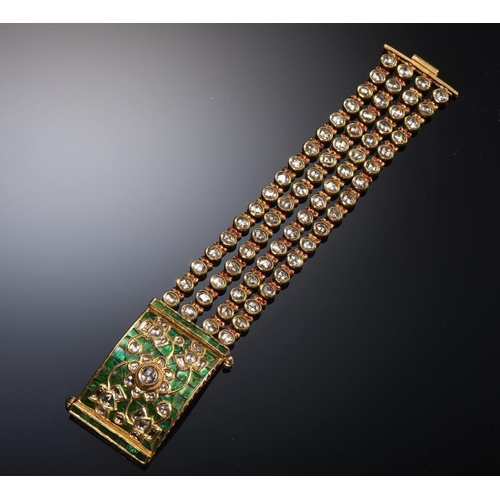 78 - AN INDIAN DIAMOND, GOLD AND TRANSLUCENT ENAMEL BRACELET, LATE 19TH C the reverse with a brrd and ten... 