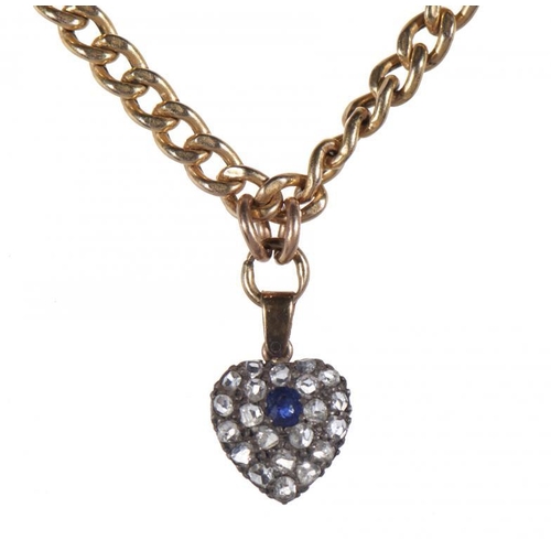 82 - A VICTORIAN SAPPHIRE AND DIAMOND PENDANT with a round cut sapphire surrounded by twenty-one rose-cut... 