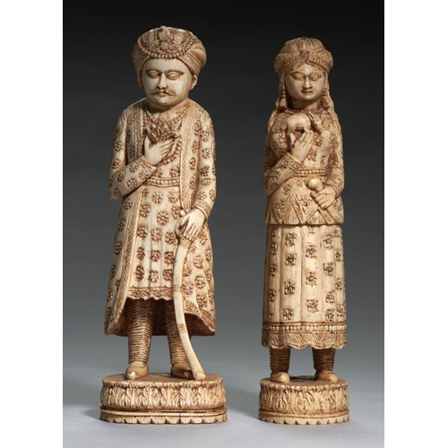 911 - TWO INDIAN MUGHAL STYLE CARVED IVORY STATUETTES, LATE 19TH C 20.5 and 21cm h 