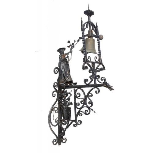 916 - A WROUGHT  IRON FIGURAL WALL BELL, FIRST HALF 20TH C  the brass bell in arched frame, the counter ba... 