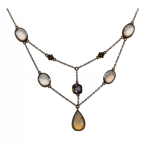 93 - AN ARTS AND CRAFTS SAPPHIRE, MOONSTONE AND OPAL PENDANT, C 1905 in gold, 50cm, marked 15ct, 4.5g... 