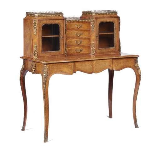 932 - A VICTORIAN WALNUT AND TULIPWOOD BONHEUR DE JOUR, C1870 with gilt brass mounts,  118cm h; 54 x 110cm... 