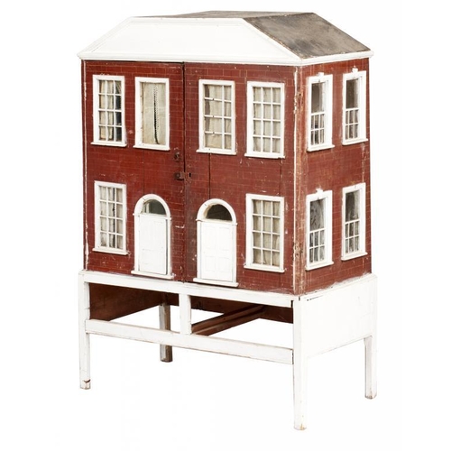 939 - A VICTORIAN WOODEN DOLLS HOUSE  the two door facade with twin panelled front doors and fenestration ... 