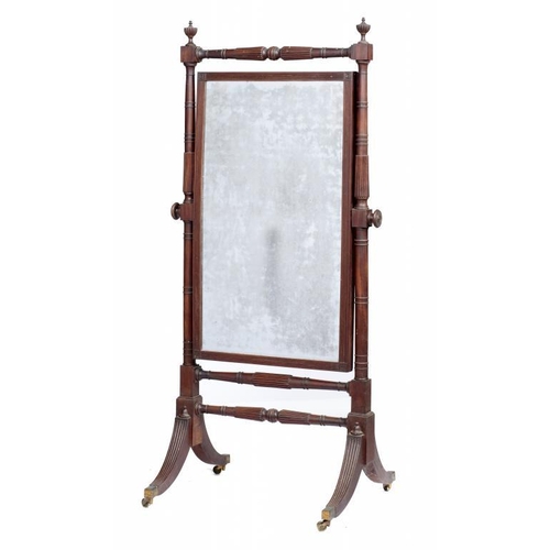 943 - A GEORGE IV MAHOGANY CHEVAL MIRROR, C1825,  reeded throughout,  with urn finials, on brass castors, ... 