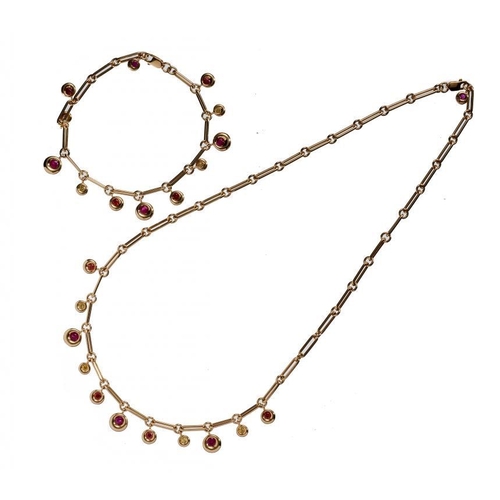 95 - CHAUMET. A GEM SET NECKLACE AND BRACELET in gold, necklace 44cm, bracelet 19.5cm, marked 750, 44.9g,... 