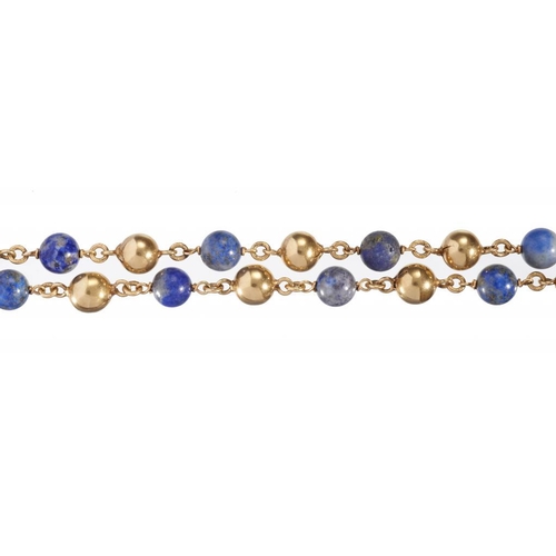 96 - A SODALITE AND GOLD BALL NECKLACE in gold, 90cm, marked 750, 48.5g