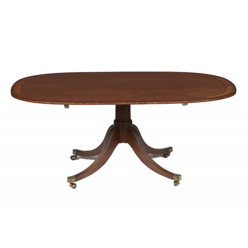 976 - A GEORGE III MAHOGANY BREAKFAST TABLE, C1800 the crossbanded oblong top on turned pillar and quadrup... 