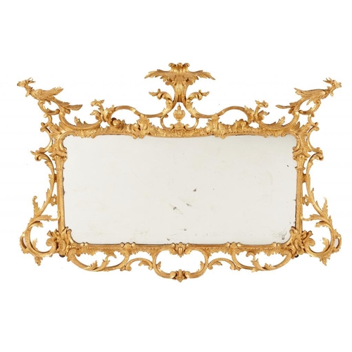 985 - A VICTORIAN   ROCOCO REVIVAL GILTWOOD MIRROR IN THE MANNER OF THOMAS JOHNSON,  LATE 19TH C  crisply ... 