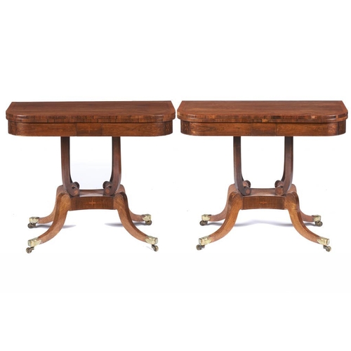 990 - A PAIR OF REGENCY ROSEWOOD AND SATINWOOD CARD TABLES, C1820  with brass palmette castors, 73cm h; 45... 