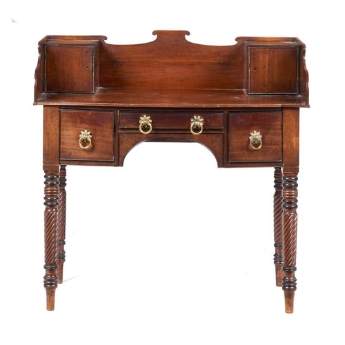 992 - A GEORGE IV MAHOGANY DRESSING TABLE, C1830  the galleried top with two enclosed cube cupboards, on s... 