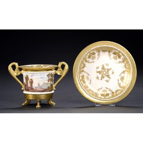 75 - A DERBY TWO HANDLED CABINET CUP AND STAND, C1820 the cup painted to either side with a wooded landsc... 